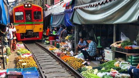 What is the malaysia to thailand train like? CRAZY TRAIN MARKET | BANGKOK THAILAND - YouTube