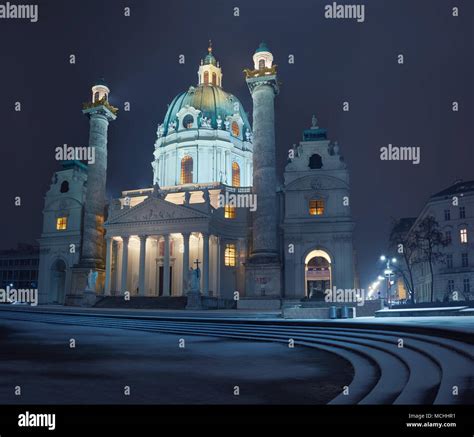 Night View Of Karlskirche Church Of St Charles In Vienna Under Snow