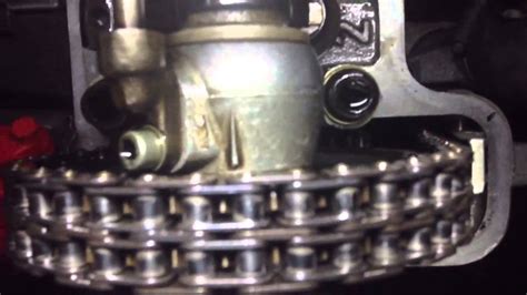 The paint marks on my chain wont line up with the punches on the gears. W114 timing chain mark - YouTube