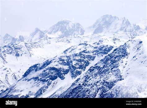 Snow Capped Mountain Peaks On Russias North Caucasus Stock Photo Alamy