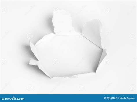 Hole Punched In The Paper Stock Photo Image Of Cracked 78183202