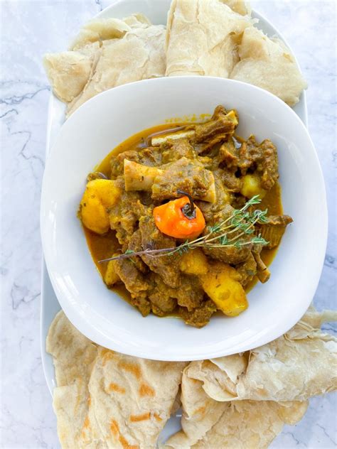 Jamaican Curried Goat And Guyanese Roti New