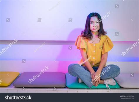 Smiling Asian Girl Sitting Cross Legs Stock Photo 1563017908 Shutterstock