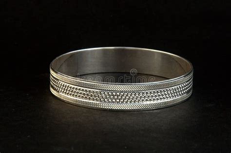 Silver Bangles And Gents Kade And X28 Hand Band And X29 Stock Image