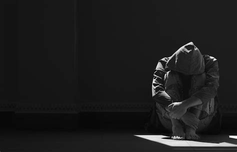 Premium Photo Light And Shadow On Surface Of Hopeless Man Sitting