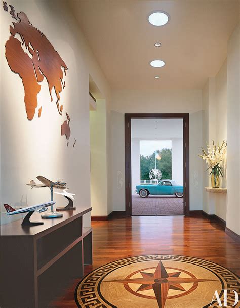 We designed the house for. John Travolta and Kelly Preston's Mid-Century Style ...