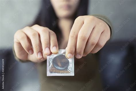 Women Carry Condoms Concepts Of Sex Education Stock Photo Adobe Stock