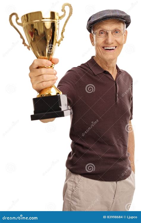 Delighted Elderly Man Holding A Golden Trophy Stock Photo Image Of