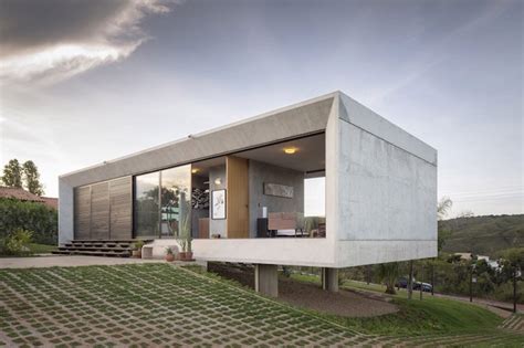 A Minimal Concrete House Offering Stunning Views From Both Sides