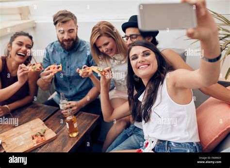 Group Of Friends Taking Selfie On A Smart Phone Young People Eating