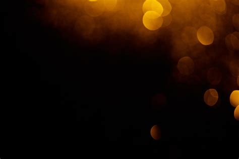 Golden Bokeh On Black Background With Copy Free Stock Photo And Image