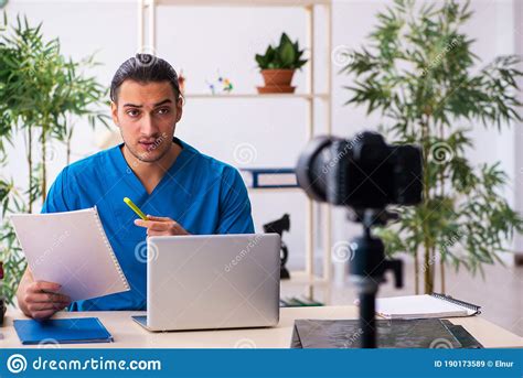 Young Male Doctor Recording Video For His Blog Stock Image Image Of