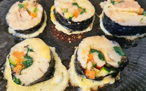 While the name indicates that it's vegetable oriented, it's not necessarily a vegetarian kimbap. Kimbap: How to make and Roll Korean Kimbap