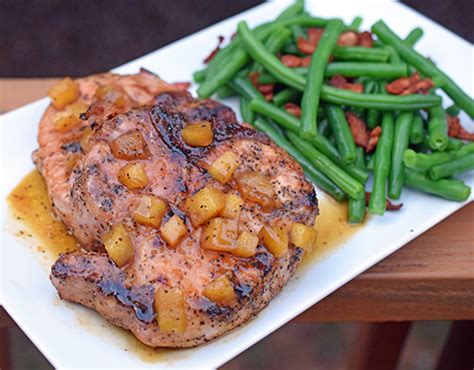 Cut off the rind and excess fat around the pork chops. Grilled Thick Pork Chops with Apple and Apricot Sauce