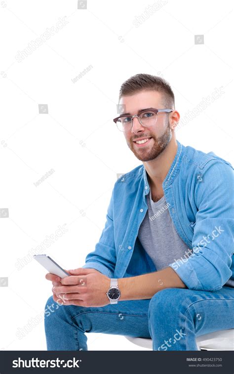 Young Man Sitting On Chair Using Stock Photo 490423750 Shutterstock