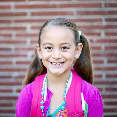 Portrait Of Girl Ready For First Day Of Grade School Del Colaborador De Stocksy Carleton