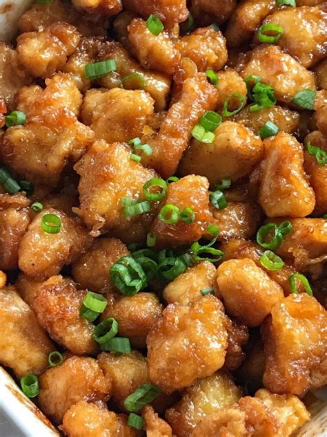 Stir in the orange zest, brown sugar, ginger, garlic, chopped onion, and red pepper flakes. Baked Orange Chicken - 100 Delicious