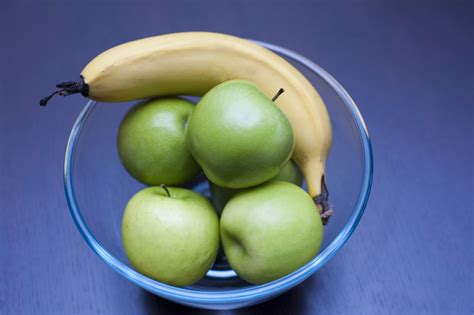 Bowl With Fresh Apples And A Banana Free Stock Image