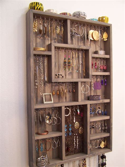 Armed with this practical guide of dos and don'ts for your master bedroom artwork display, you too can set up an exhibition that enhances the room while making you feel all warm and fuzzy when you retire for the evening. Wall Jewelry Display Case Jewelry Organizer Large Grey