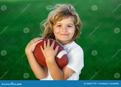 Outdoor Kids Sport Activities Kid With American Football Rugby Ball