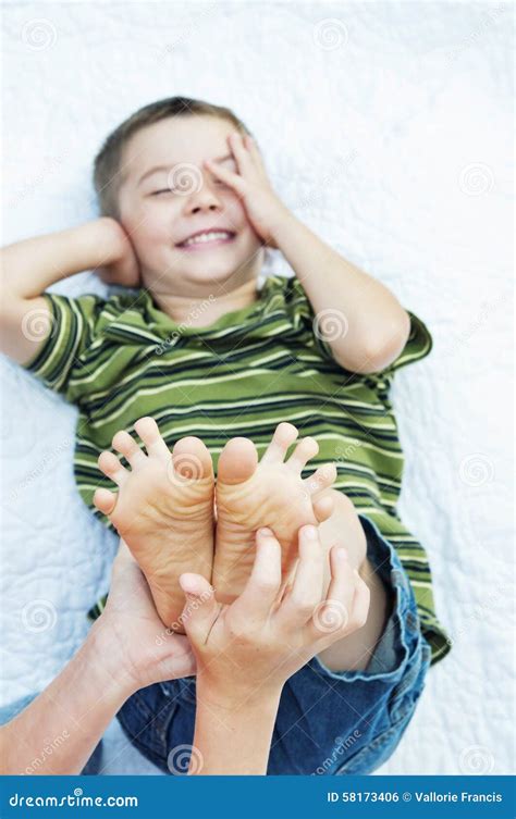 Boy Laughing Feet Tickling Stock Photo Image Of Hands 58173406