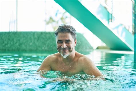 Happy Smiling Older Man Enjoying Indoor Swimming Pool Concepts Of Spa