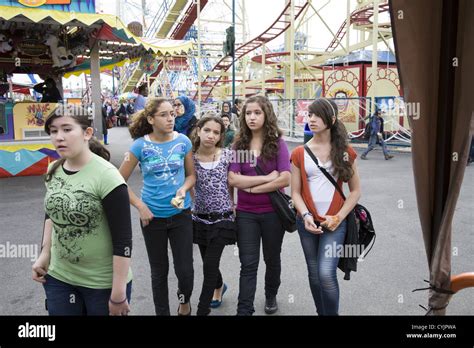Group Of Young Teens At The Amusement Park At Coney Island Stock Photo