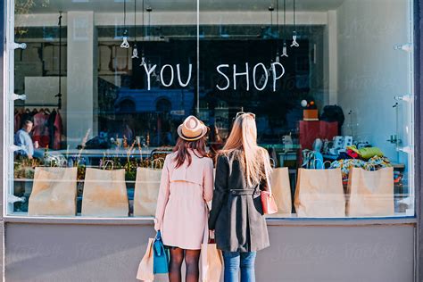 Girlfriends Window Shopping by Aila Images