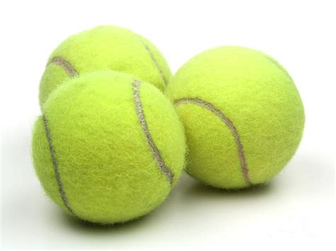 The latest tennis balls offer complete playability and durability for match day. Tennis balls Photograph by Blink Images