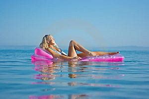 Blonde Girl On Inflatable Raft Royalty Free Stock Photos Image