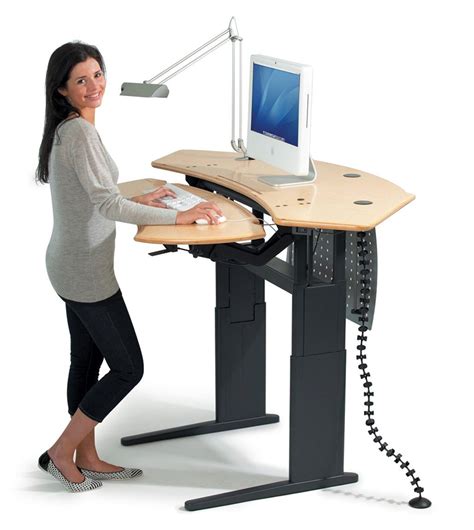 Four electric motor pro desks or standing desk converters from $49. Working on a Standing Desk | Fancy Girl Designs