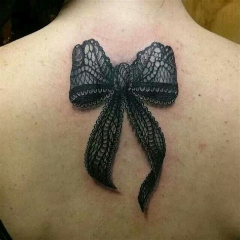 Black Lace Bow Tattoo On Girls Back