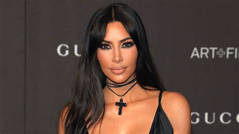 Kim Kardashian Shows Off New Look As She Dyes Her Hair Red