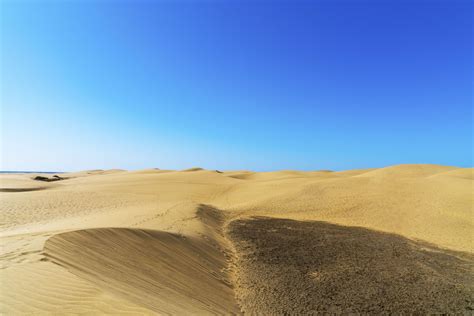 Photo Of Desert Under Blue Sky · Free Stock Photo