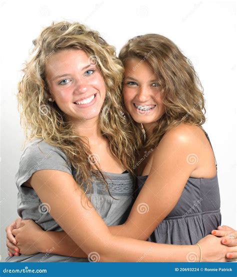 Sisters Hugging Stock Images Image 20693224