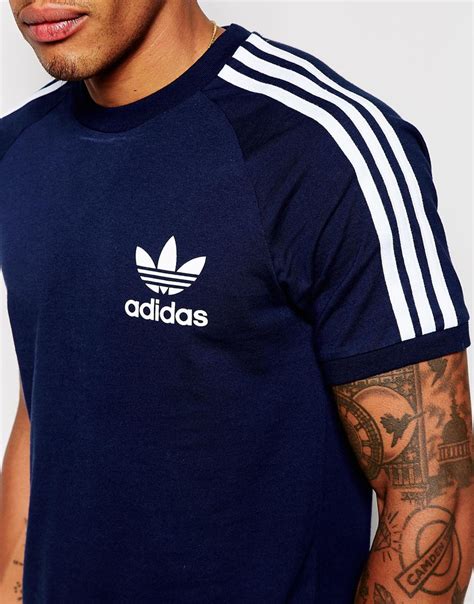 Begin every match or workout in comfort and style with our collection of adidas men's clothing, shoes and sportswear accessories. Lyst - Adidas Originals California T-shirt Ab7604 in Blue ...