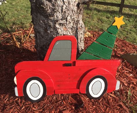This Vintage Red Christmas Truck Is Bringing Home The Christmas Tree