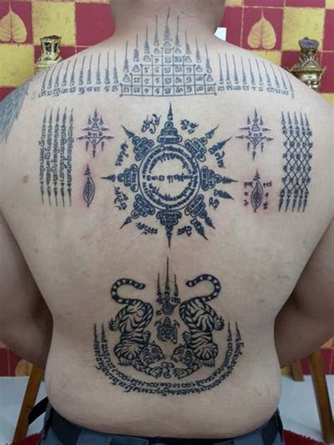 Rare Sak Yant Tattoos By Thai Monks No Ordinary Ink Tattoo Sak Yant Tattoo Thai Tattoo