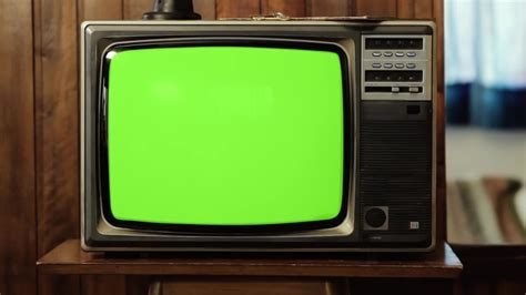 Retro 70s Tv Set With Green Screen In The Living Room Of A House At