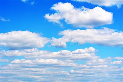 White Fluffy Clouds On Blue Sky View From Below Stock Image Image Of