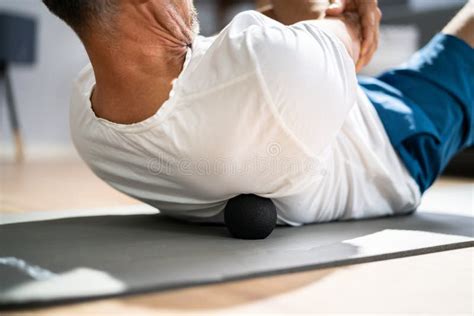 Back Trigger Point Massage Using Spiky Ball Stock Image Image Of Muscle Fitness 235044007