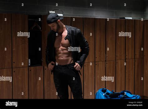 Shirtless Muscular Young Male Athlete In Leather Jacket In Gym Dressing