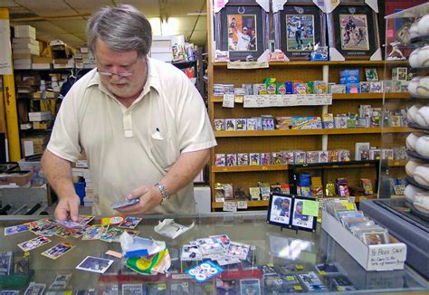 Lots of info on the cards and background on. Baseball cards and a stick of bubble gum - do those packs still exist? - Beaumont Enterprise