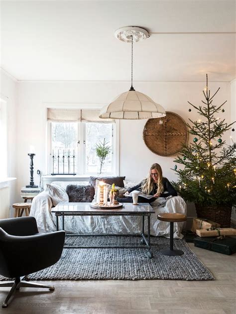 Discover the latest trends for scandinavian interior, scandinavian bedroom, scandinavian living room, scandinavian kitchen, scandinavian design, scandinavian style, scandinavian decor, scandinavian bathroom, swedish style home, scandinavian decor diy, scandinavian home decor. 14 Gorgeous Scandinavian Living Rooms Dressed For Christmas