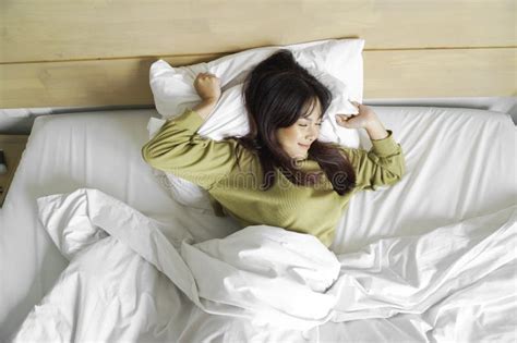 Portrait Of Beauty Happy Asian Woman Awaking Wake Up On The Bed Sleep