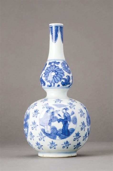 A Blue And White Double Gourd Vase Kangxi 1662 1722 Decorated With