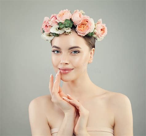 Smiling Woman With Clear Skin Spa Model With Flowers Stock Photo