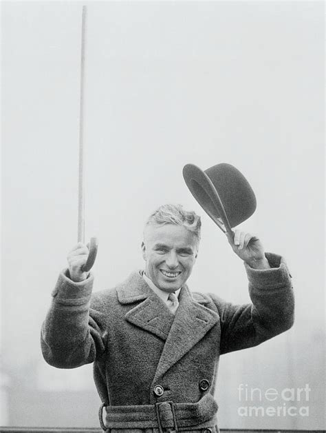 Charlie Chaplin Raising Hat By Bettmann