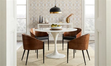 Does anyone have experience on how many people can realistically fit around a 42 or 48 round table with an 18 extension? Top 5 Light Fixtures for a Harmonious Dining Room ...