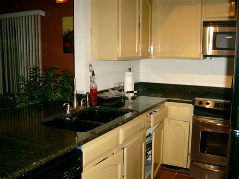 Paint the edges and insides of the cabinet doors. If you painted your kitchen cabinets... (vinyl, interior ...